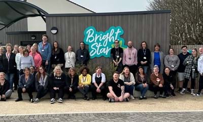 Bright Star staff team picture outside the children's home