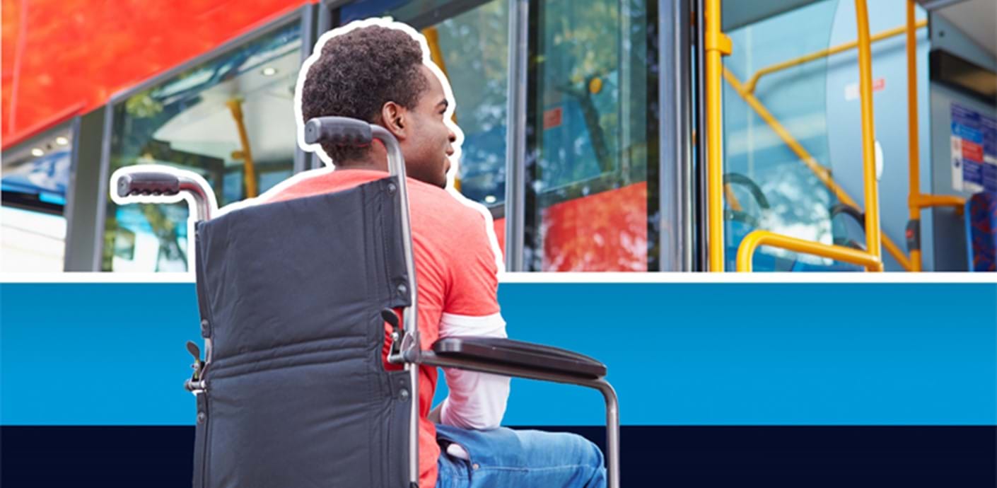 nojs Boy in wheelchair next to a bus
