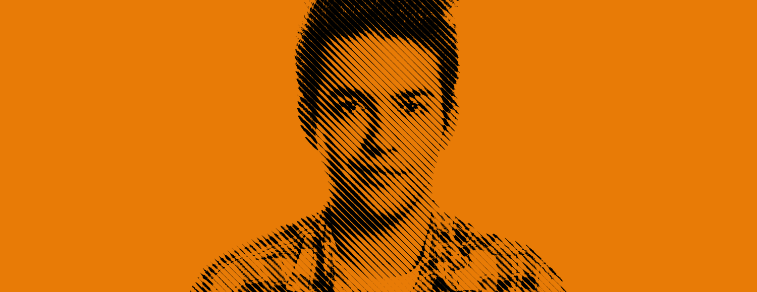 Young man with a shy smile