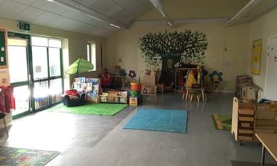 Play room with play mats on floor