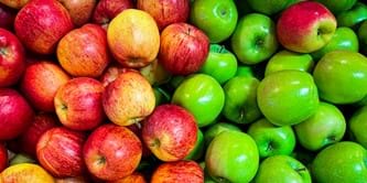 A pile of red and green apples.