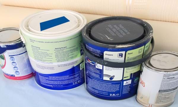 4 containers of paint.