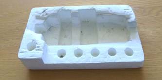 A piece of polystyrene packaging.