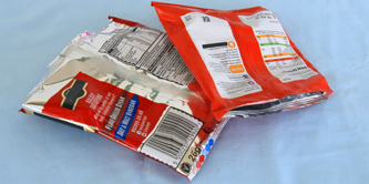 2 empty crisp packets.