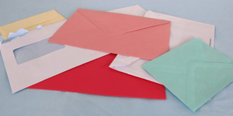 A number of different coloured envelopes.