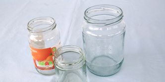 3 empty jam jars.