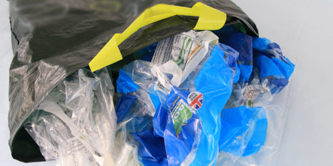 A plastic bag containing other plastic bags.
