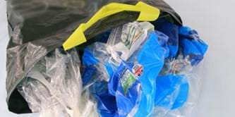 A plastic bag containing other plastic bags.