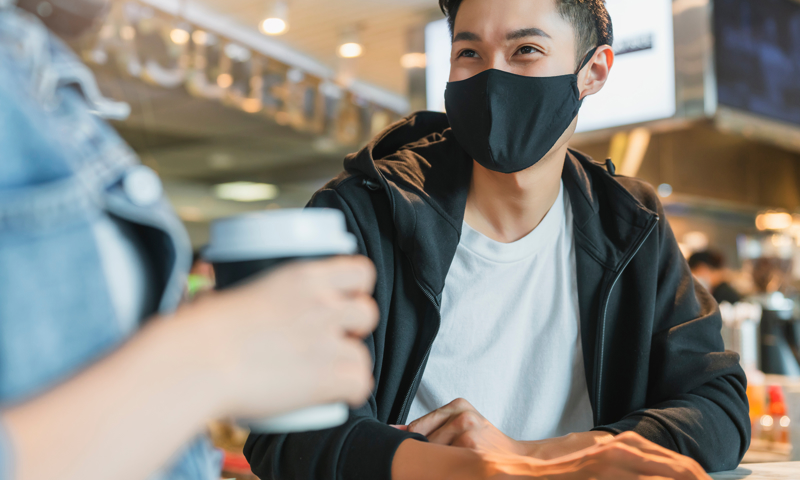 Young boy mask coffee