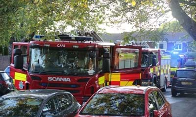 Fire engine in a cul-de- behind parked cars