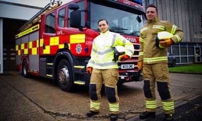 Daniella Hodge in the new hi-vis jacket and retained firefighter Stewart Ellaby in the new standard kit.