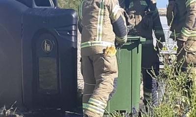 firefighters tackling the bin fire in Shoreham