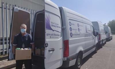 Food parcels being packed into a West Sussex Libraries van for delivery
