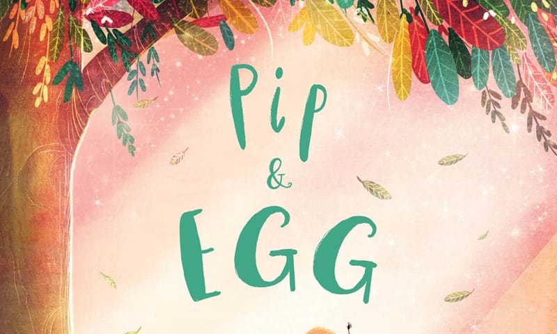 Front cover of illustrated children's book 'Pip and Egg' - An egg and a pip hold hands under a tree whilst jumping on a grassy knoll