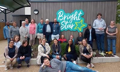 Staff at Bright Star children's home in Worthing celebrating an outstanding Ofsted rating