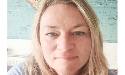 Sarah, looking intently at the camera