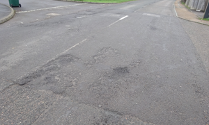The current surface on the B2133 Vicarage Hill, Loxwood 
