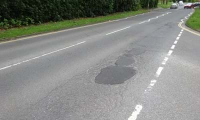 The current surface on the A2220 Worth Park Avenue 