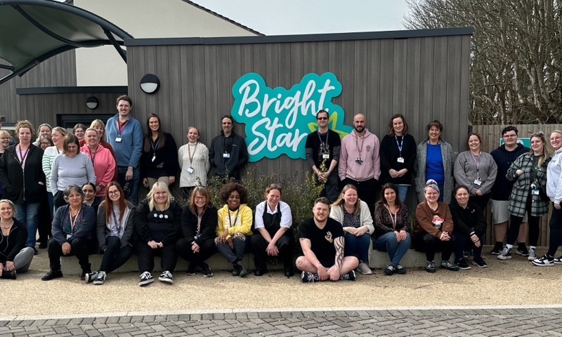 Bright Star staff team picture outside the children's home