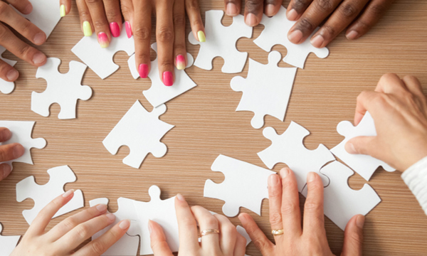 People doing a jigsaw