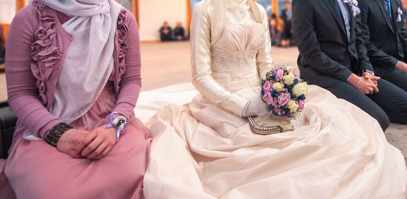 nojs People, including a bride, at an Islamic marriage ceremony.  