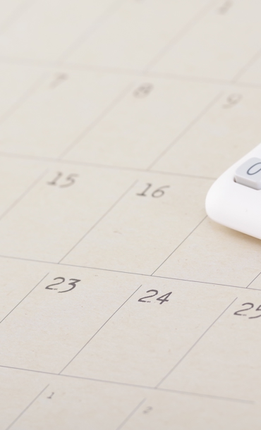 Calendar, calculator and credit cards.