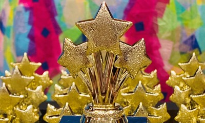 An image of a golden award shaped like a star with the words 'Epic Awards Nominee 2023'