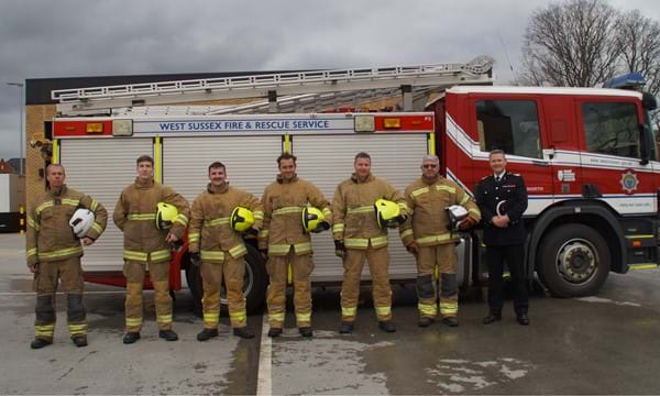 The four new recruits with their trainers and the Assistant Chief Fire Officer, Peter Rickard. 