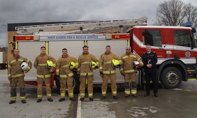 The four new recruits with their trainers and the Assistant Chief Fire Officer, Peter Rickard.