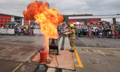 Fire demonstration in front of a large crowd at Worthing Fire Station