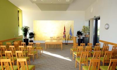 The Henshall ceremony room with chairs laid out facing the front table