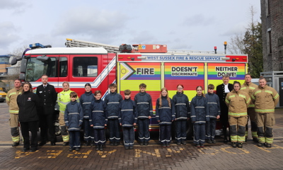 GRIT students standing in front of a fire engine