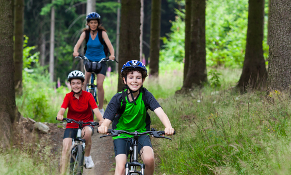 Young family riding bikes