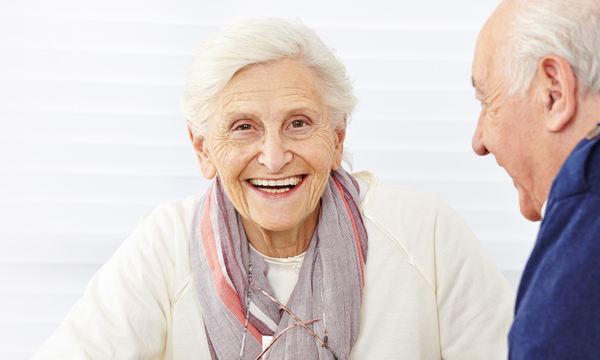 Older man and woman having a conversation