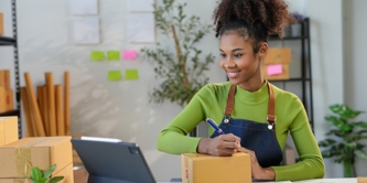 A lady looking at an ipad