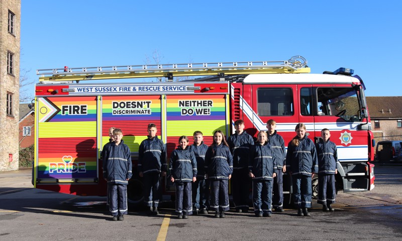 GRIT students standing in front of a fire engine