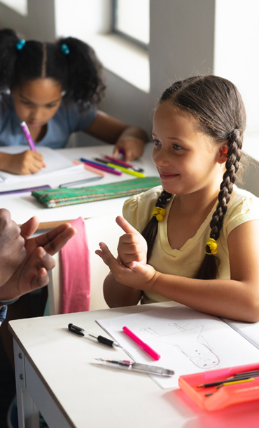 Teacher with two pupils