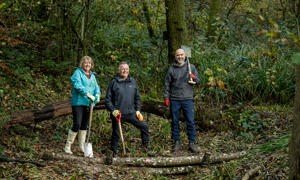 Deborah Urquhart, Paul Marshall and Leigh Whitehouse helping build a leaky dam