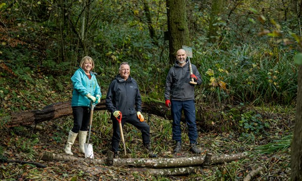 Deborah Urquhart, Paul Marshall and Leigh Whitehouse helping build a leaky dam