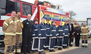 BLAZE students standing in front of a fire engine