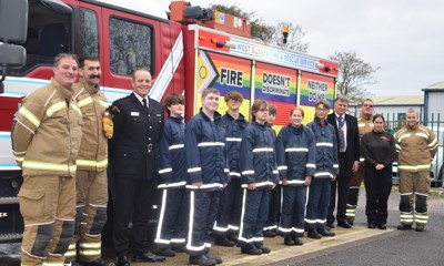 BLAZE students standing in front of a fire engine
