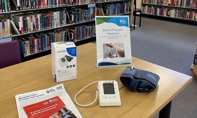 Blood pressure monitor on a table, in a library