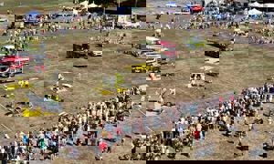 Aerial view of people watching a road traffic collision demonstration in Oaklands Park