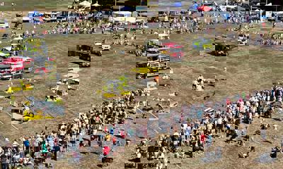 Aerial view of people watching a road traffic collision demonstration in Oaklands Park