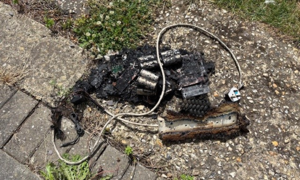 Fire damaged battery and extension lead