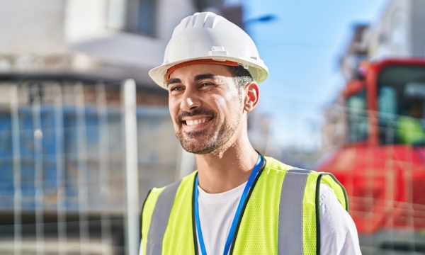 Older, male, caucasian, happy. Shaking hands with client