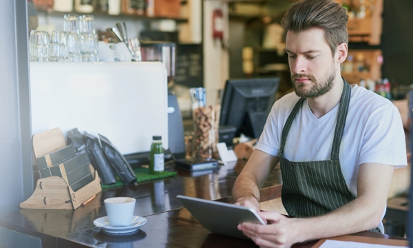 A man working in a cafe