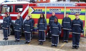 IGNITE students standing in front of a fire engine