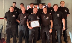 Watch Manager Danny Flynn with colleagues at his retirement presentation