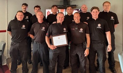 Watch Manager Danny Flynn with colleagues at his retirement presentation
